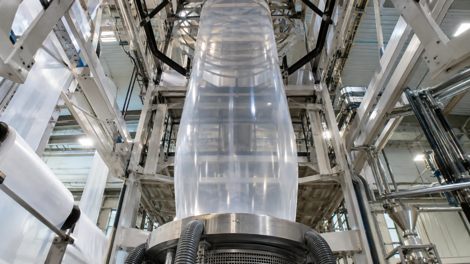 Polyethylene film bubble rising on a blown film extrusion line