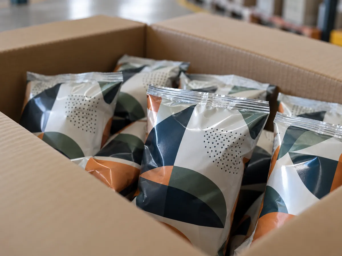 Pillow bags with fin back seals and crimped end seals